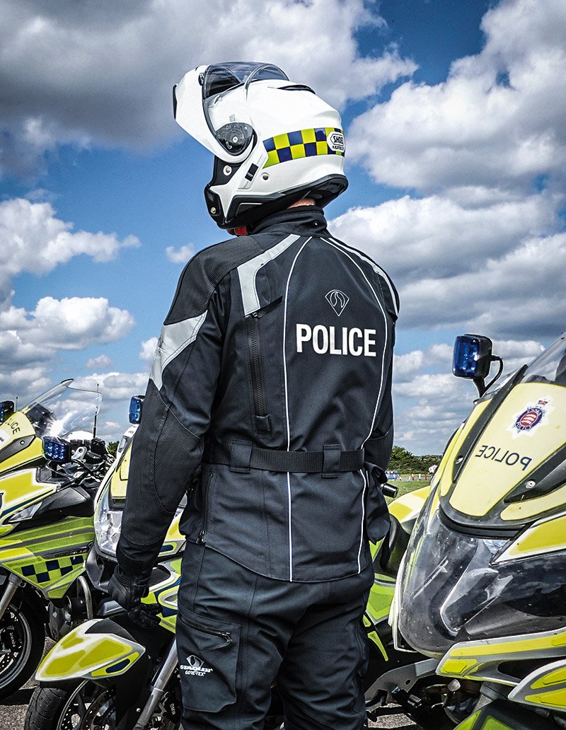 Police officer wearing Shoei Neotec 2 helmet